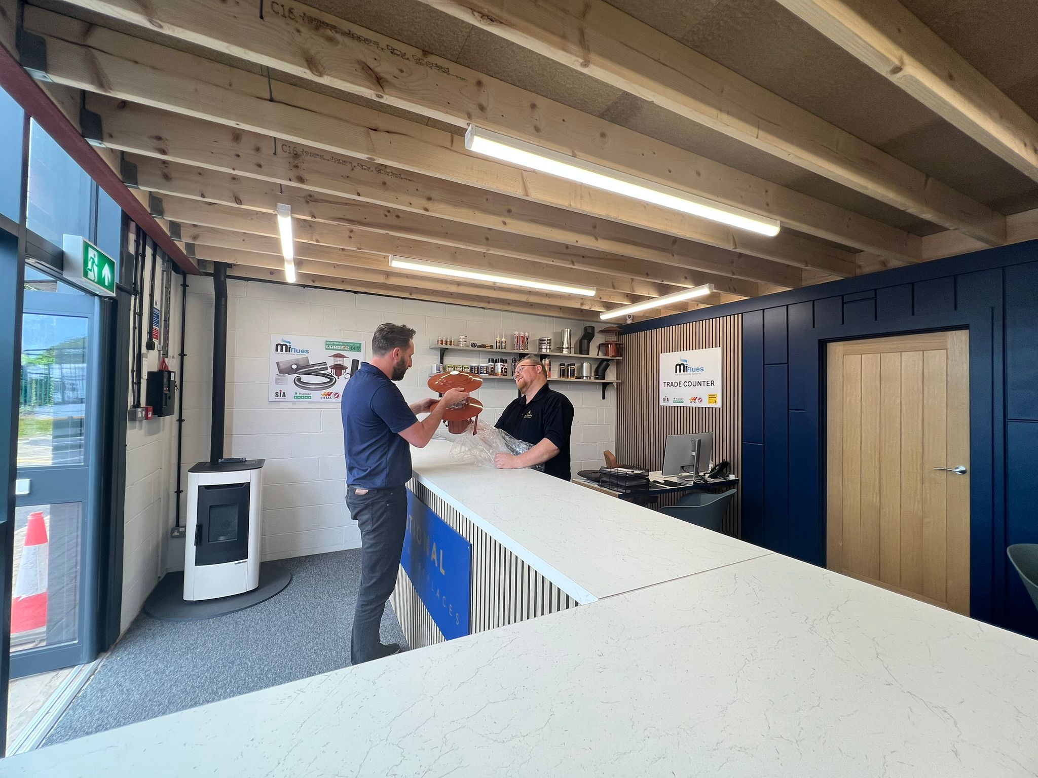 Customer being served at the National Flues trade counter