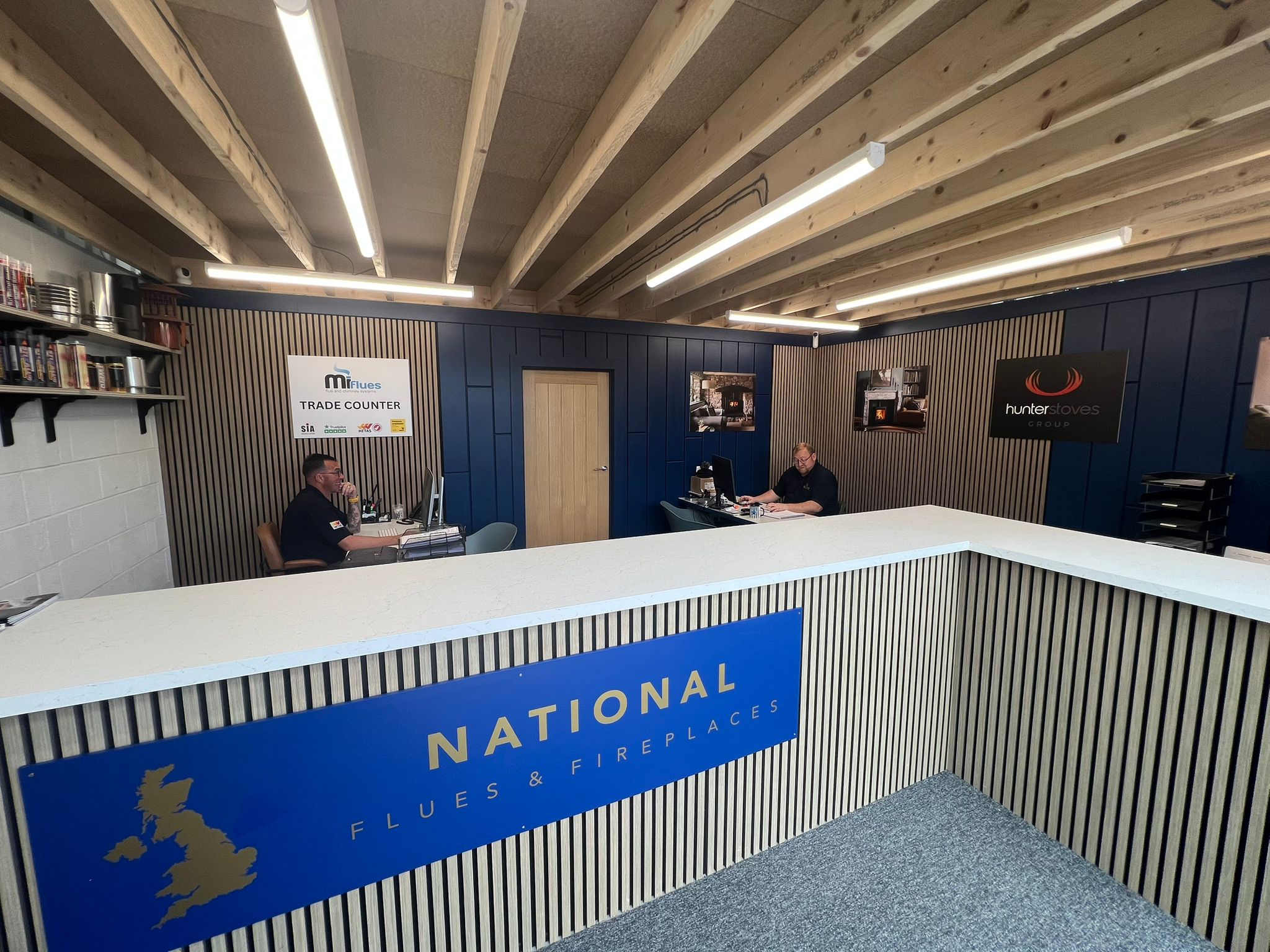 Team helping customers at the counter